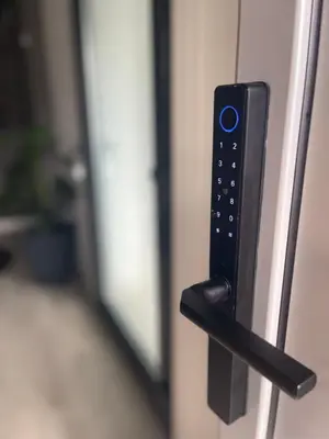 a remote control sticking out of a door at Apartman Kis in Jajce