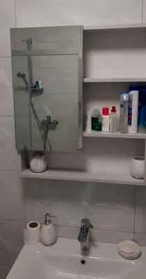 a bathroom with a sink and a mirror above it at Apartman ALEM Bihac in Bihać