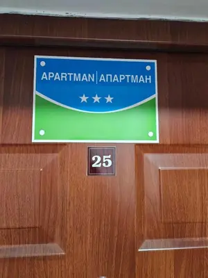 a sign on a door that says aprilventhventh istg at Apartman Basic Doboj in Doboj