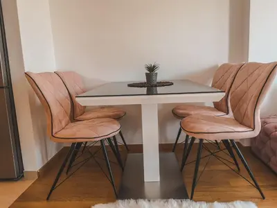 a white table with two chairs and a white table at Apartman Alina Comfort in Banja Luka