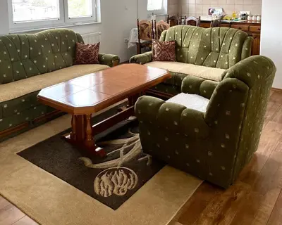 a living room with two couches and a coffee table at BIG Apartment 3 Bedrooms in Bihać