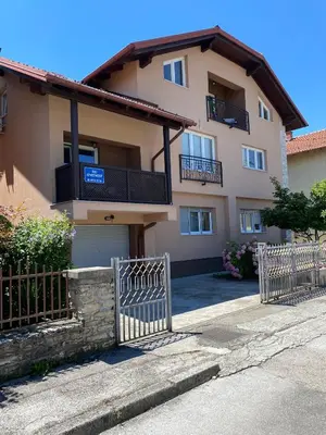 a building with a gate in front of it at BIG Apartment 3 Bedrooms in Bihać