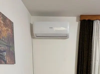 a air conditioner on a wall in a room at COZY CENTER Apartment Bihać in Bihać