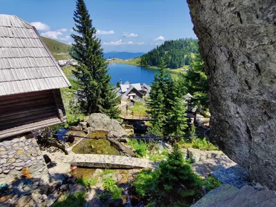 an aerial view of a house next to a lake at Prokosko Resort in Fojnica