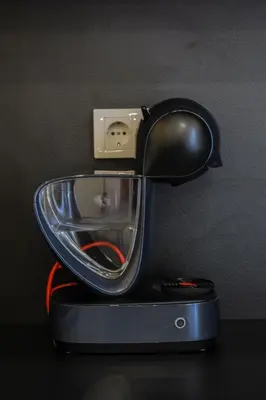 a cuisinart mixer sitting on top of a table at Apartmani President I in Banja Luka