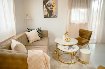 a living room with a couch and a table at Paradise in Bihać