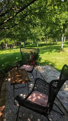 two chairs and a table in a park at RELAX HOME Visoko in Visoko