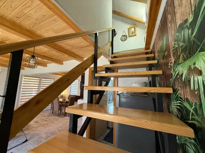 a staircase in a house with wooden floors at Otoka Josikovic in Šipovo