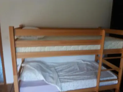 two bunk beds in a small room at Villa Goleš Travnik in Travnik