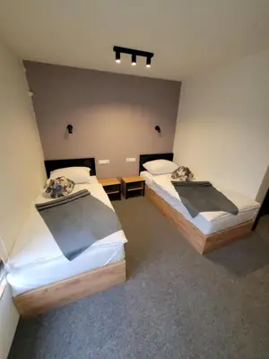 a room with two beds in a room at Motel Bihać in Bihać