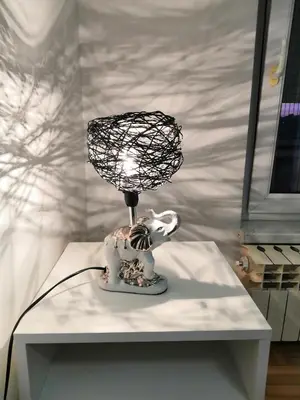 a lamp on top of a white table at Milgor in Banja Luka