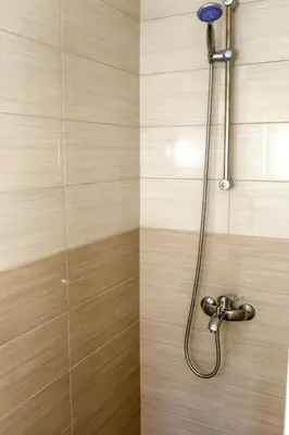 a bathroom with a shower with a shower head at Paulinio in Jajce