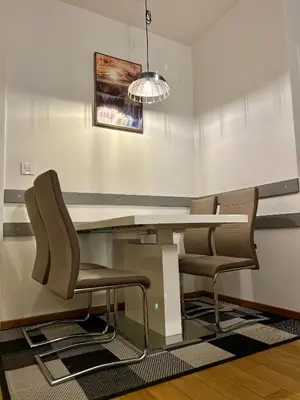 a conference room with a table and chairs at Apartman Nova Varos Banjaluka in Banja Luka