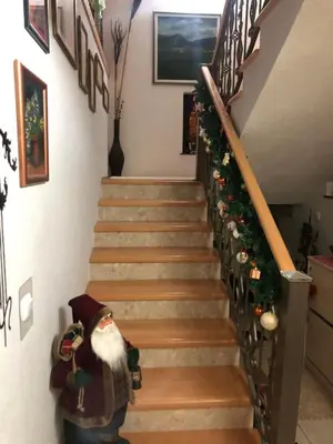 a set of stairs with santa claus on them at Holiday home Veky in Kupres