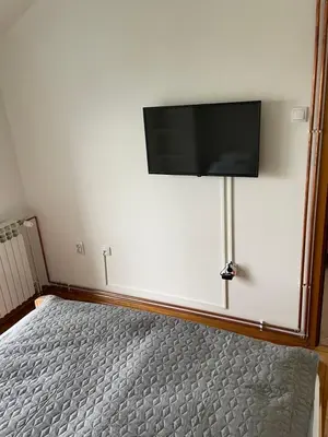 a room with a flat screen tv on a wall at Lara in Banja Luka