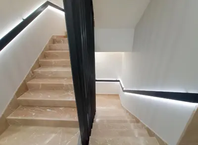 a stairway with a stair railing and a stair case at Premium Apartmani Banja Luka in Banja Luka