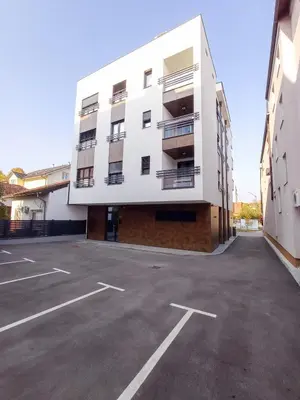 an empty parking lot in front of a building at Premium Apartmani Banja Luka in Banja Luka