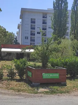 a sign for a city block in front of a building at S&S Apartman Banja Luka in Banja Luka