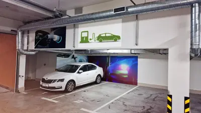 a car is parked in a garage at Hotel Integra Banja Luka in Banja Luka