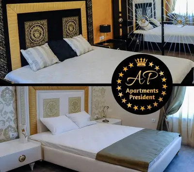 a bedroom with a king sized bed with a sign on it at Apartmani President IV in Banja Luka