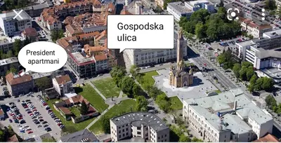an overhead view of a city with a tall tower at Apartmani President IV in Banja Luka