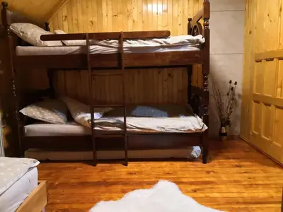 a group of bunk beds in a room at Vikendica Ajla in Travnik