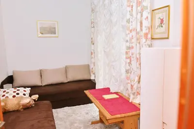 a living room with a couch and a table at Apartman centar blizina Kastela i Splava in Banja Luka