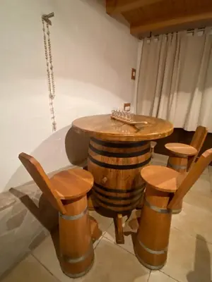 a table and chairs with a chess board on top of it at Kuća za odmor Ivana in Kupres