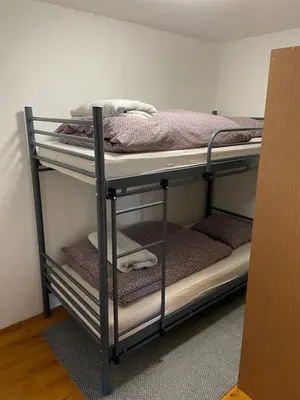a couple of bunk beds in a room at Apartman Antonia in Kupres