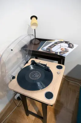 a record player sitting on top of a table at Apartman Venezia in Banja Luka