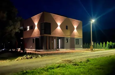 a house at night with a street light at Lohovo Villa Bukva in Otoka