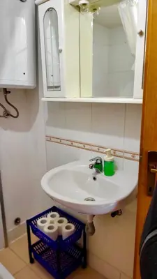 a bathroom with a sink and a mirror at Una Kamp in Bosanska Krupa