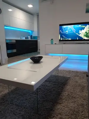 a white table with a bowl on it in a kitchen at Elena apartmani Tuzla in Tuzla