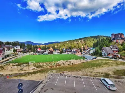 an aerial view of a soccer field in a town at APARTMAN SNOW Vlašić in Vlasic