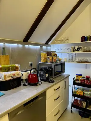 a kitchen with a counter with a tea kettle on it at KARTAL centar apartment in Bihać