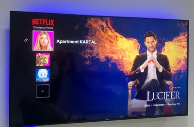 a television screen with a poster of a movie at KARTAL centar apartment in Bihać