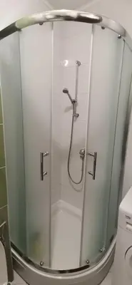 a shower with a glass door in a bathroom at Apartman Benz studio in Banja Luka