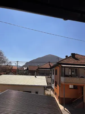 a view of the roofs of buildings in a city at City apartment 2 in Visoko