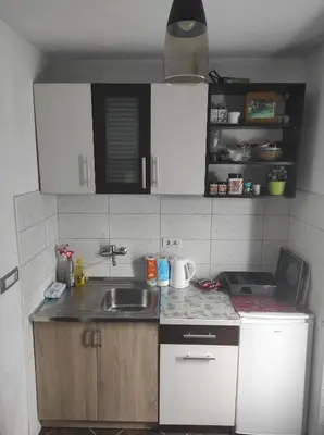 a kitchen with a sink and a counter top at Dreamhouse Bosnia in Visoko