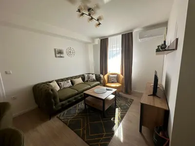 a living room with a couch and a table at Apartman Anđela in Livno
