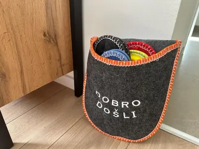 a black bag with colorful pins in it at Apartman Anđela in Livno