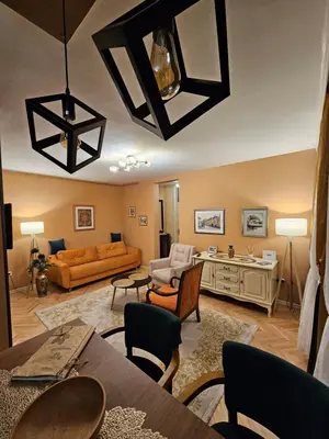 a living room with a couch and a table at Elegant Visoko in Visoko