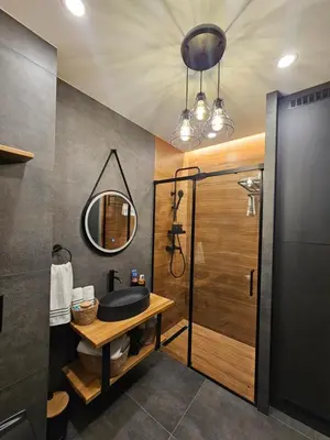 a bathroom with a sink and a mirror at Elegant Visoko in Visoko
