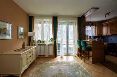 a kitchen with a large window and a table at Elegant Visoko in Visoko