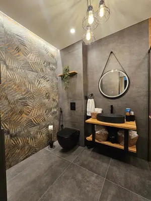 a bathroom with a black sink and a mirror at Elegant Visoko in Visoko