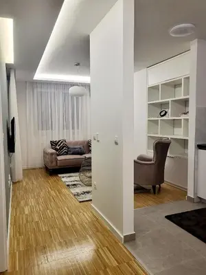 a living room with a couch and a chair at Nika in Banja Luka