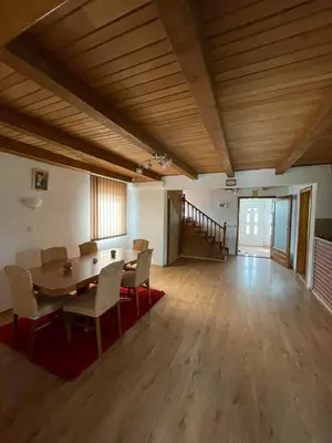 a large room with a table and chairs in it at Smjestaj na selu Stankovic - Pliva in Šipovo