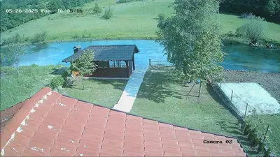 an aerial view of a house next to a river at Smjestaj na selu Stankovic - Pliva in Šipovo