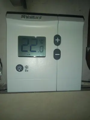 an alarm clock sitting on top of a machine at Royal Residence in Visoko