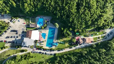 an aerial view of a house with a swimming pool at Motel 
